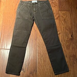 Women’s True Religion brown denim jeans.